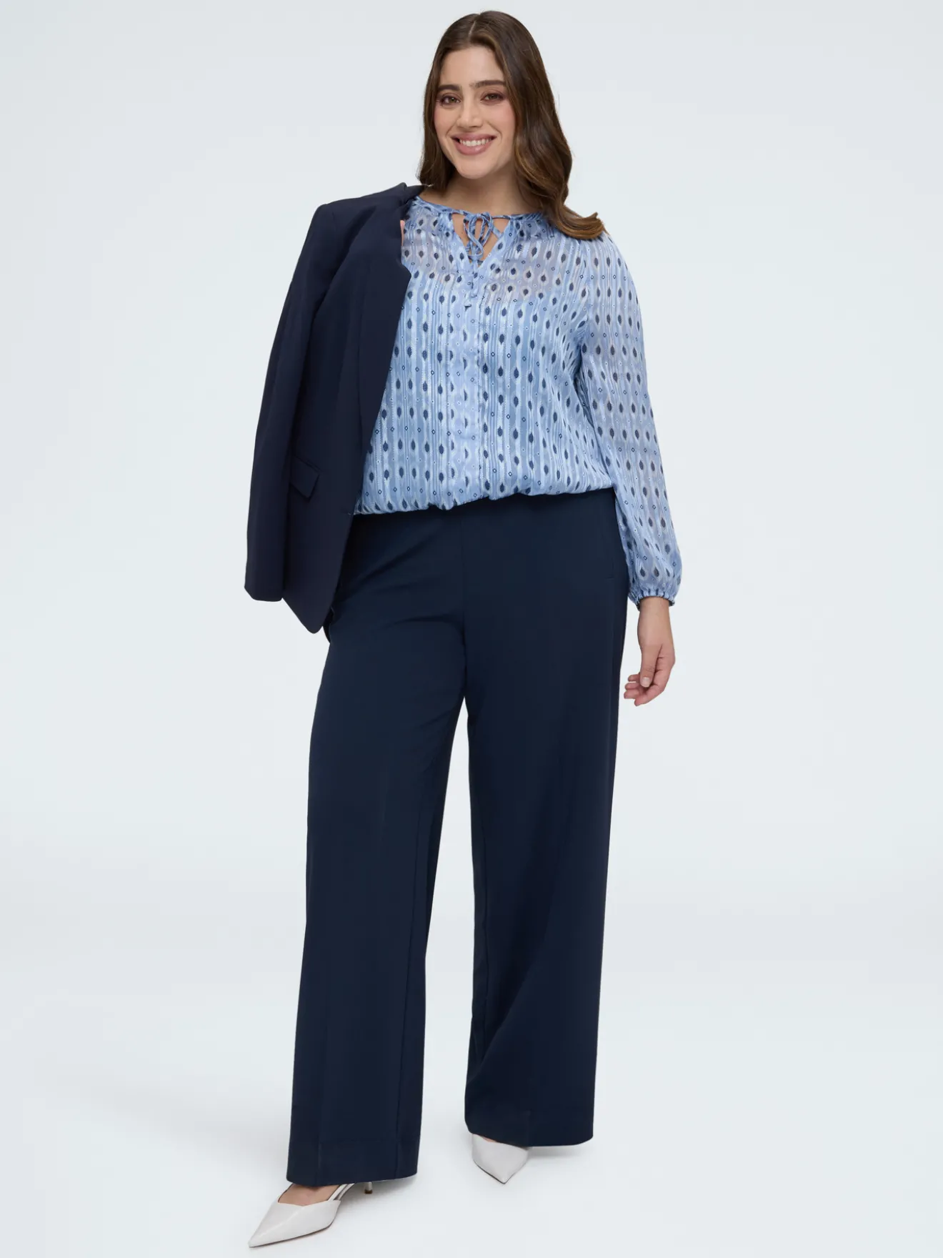 Blusa in tessuto lurex con stampa