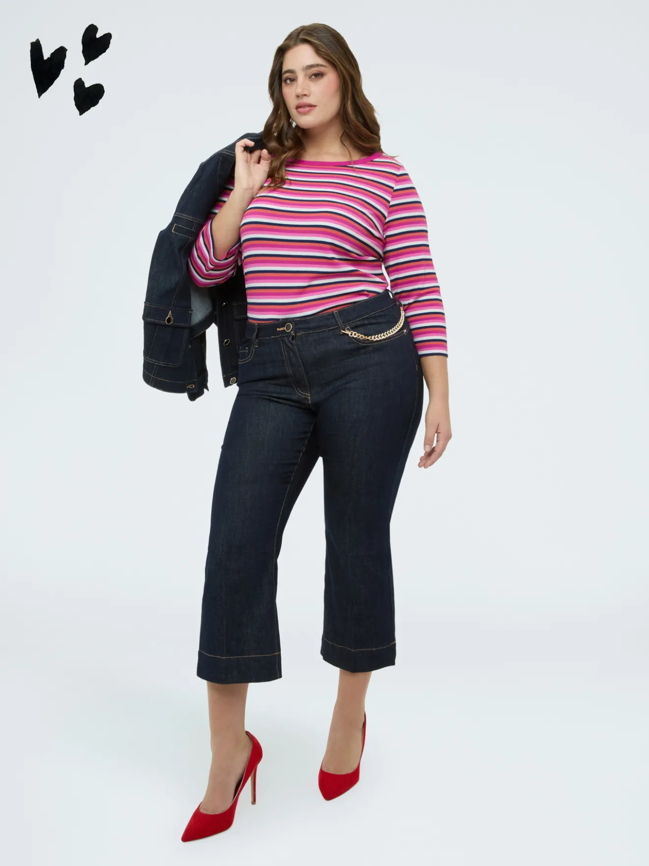 Jeans Kick Flare con catenella decorativa