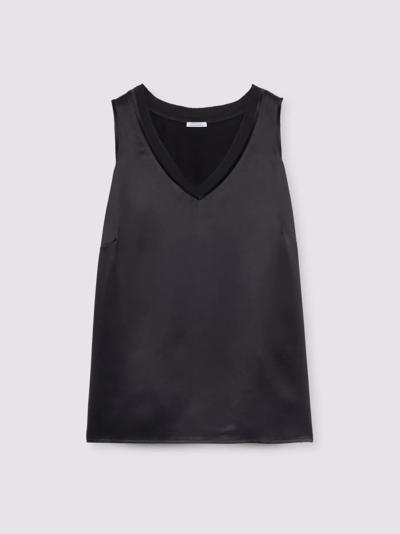 Top bimaterico con scollo a V