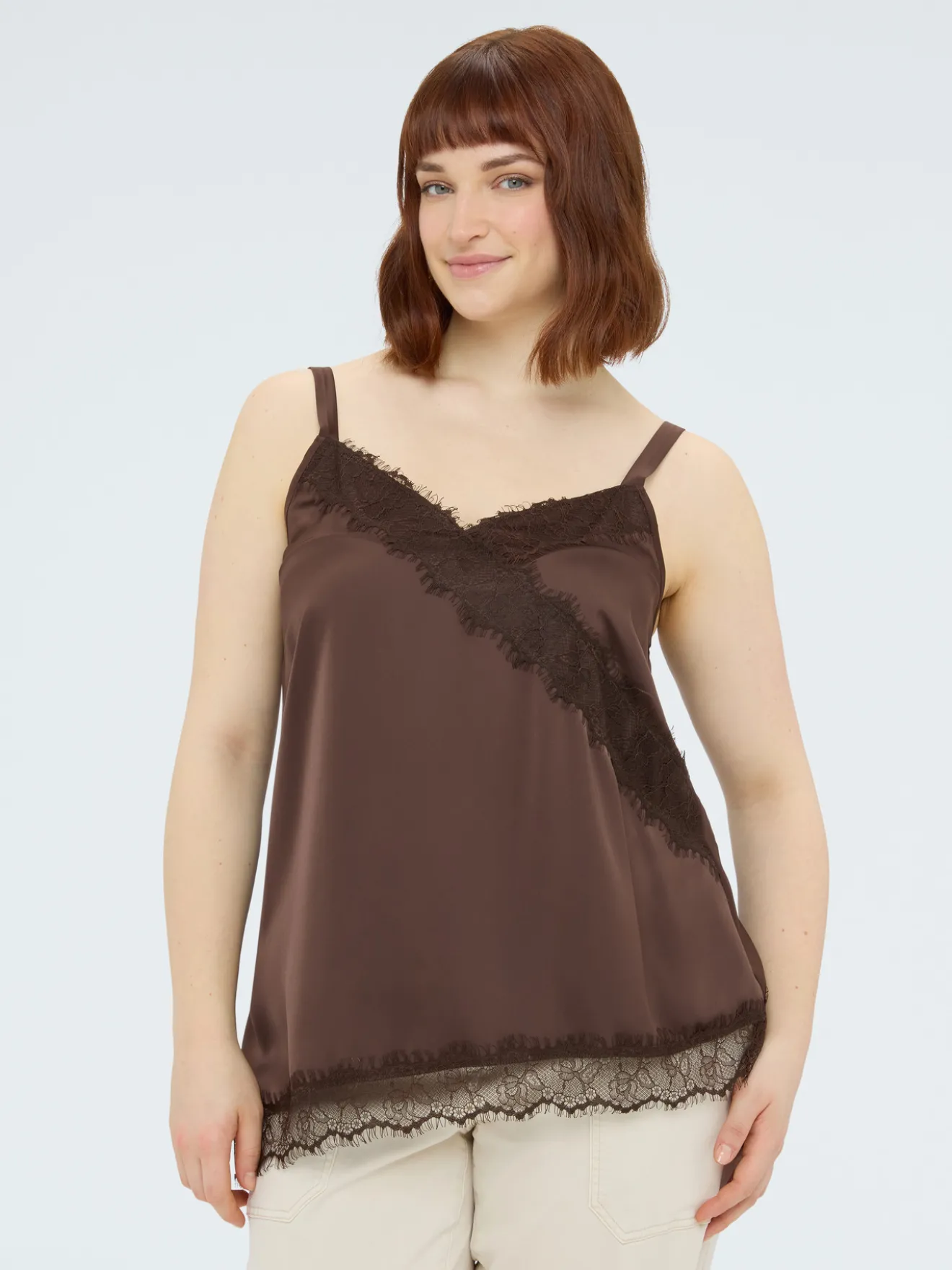 Top in raso con dettagli in pizzo