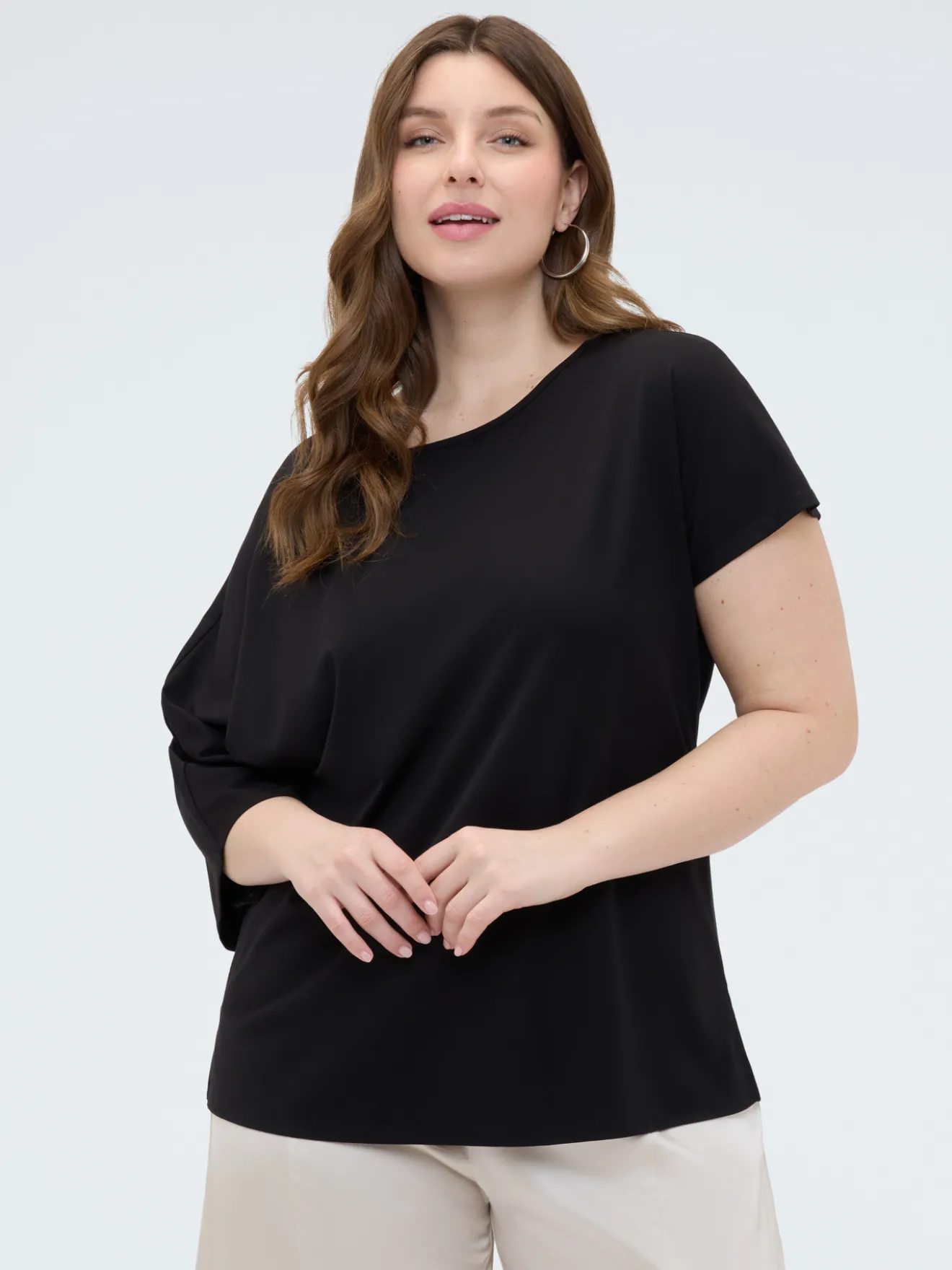 T-shirt maniche asimmetriche