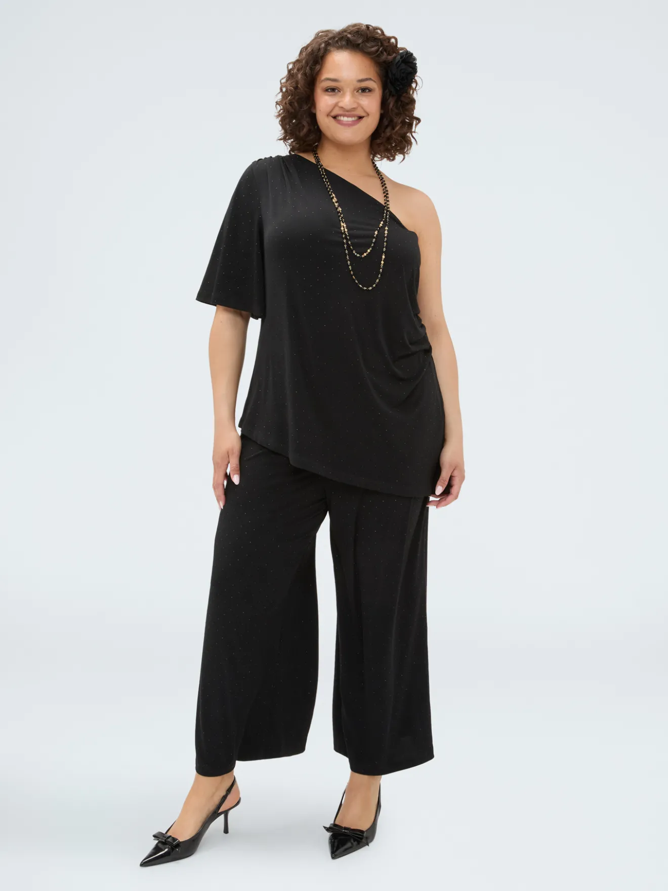 T-shirt monospalla in jersey con punti luce